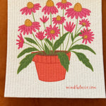 one Swedish dishcloth with a pink floral illustration.